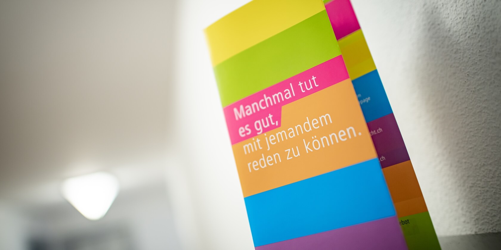 Beratungsflyer auf dem Tisch